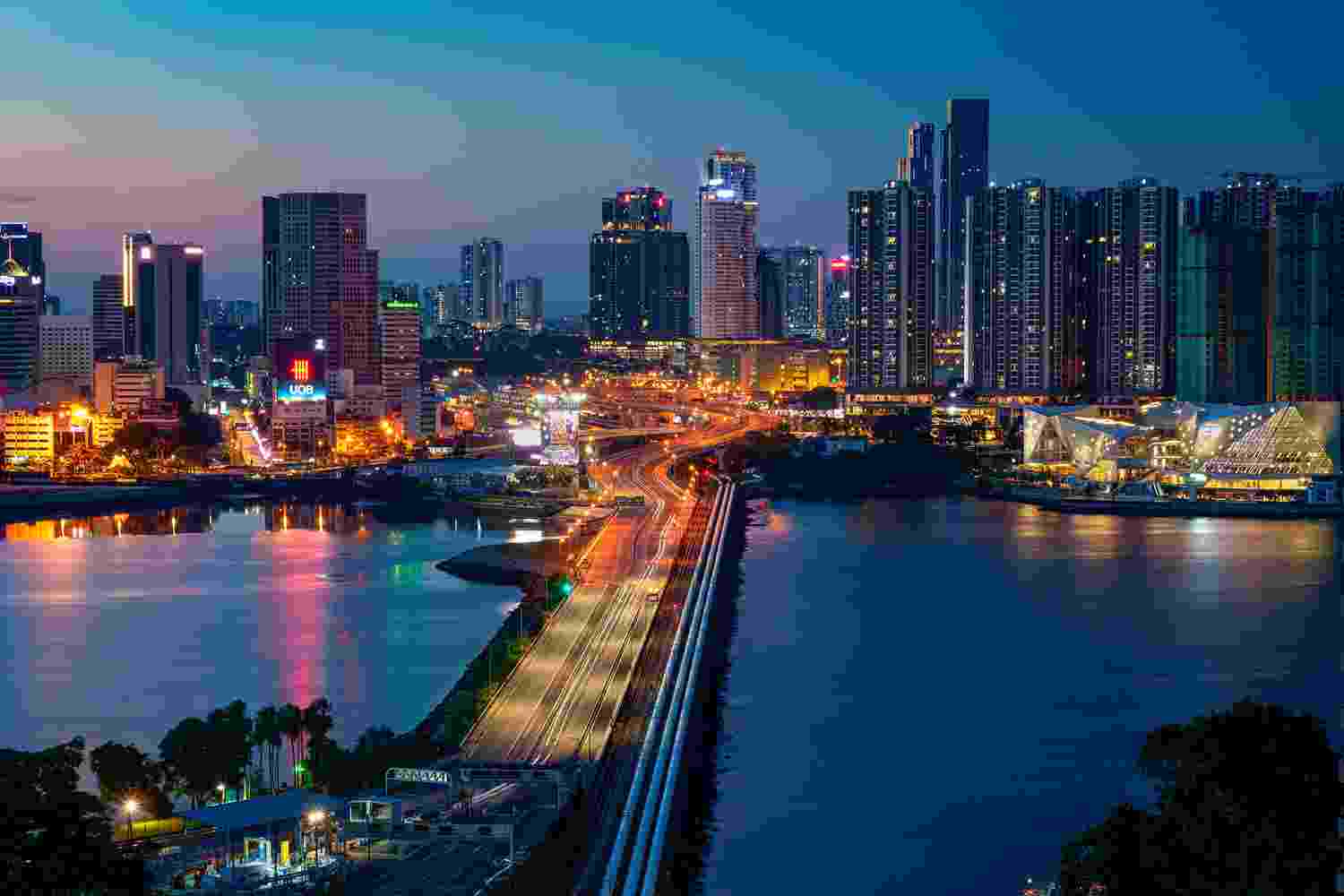 Panorama of the Johor Bahru skyline, populated with skyscrapers, at night, Malaysia